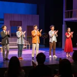 ROKOK 88 theatre scene with captivated audience enjoying a vibrant performance.